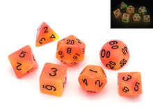 Load image into Gallery viewer, Orange and Yellow dual colour glow in the dark dice set 7 piece