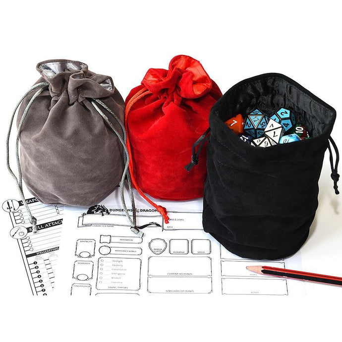 Three Drawstring Dice Bags filled with dice (Gray, Red, Black) From Left to Right
